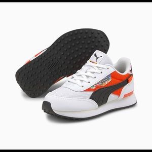 Puma boys tennis shoe 10.5 orange and black , nwt and box stock photo